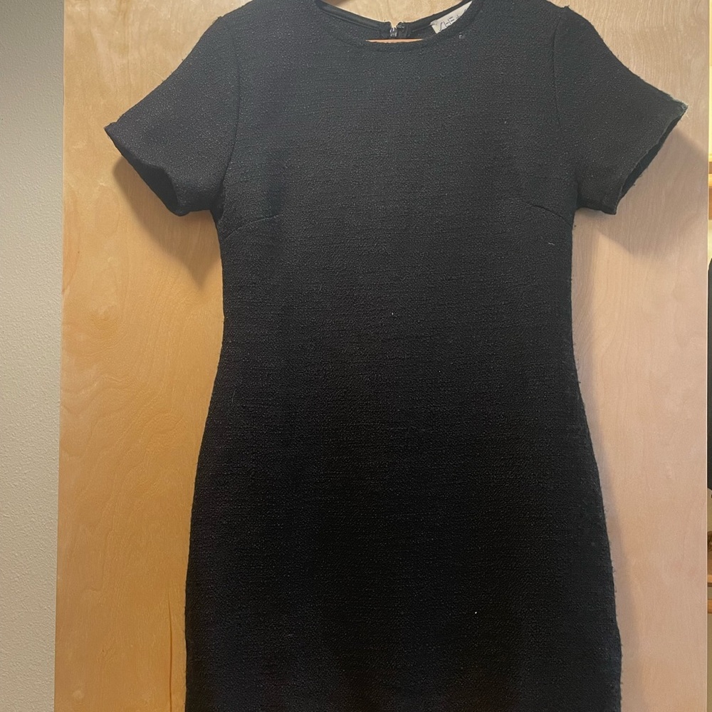 Super adorable, mid thigh length, tweed black dress.
